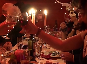 Adult swingers dining together involving feasting