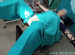 Gynecologist having fun with the patient